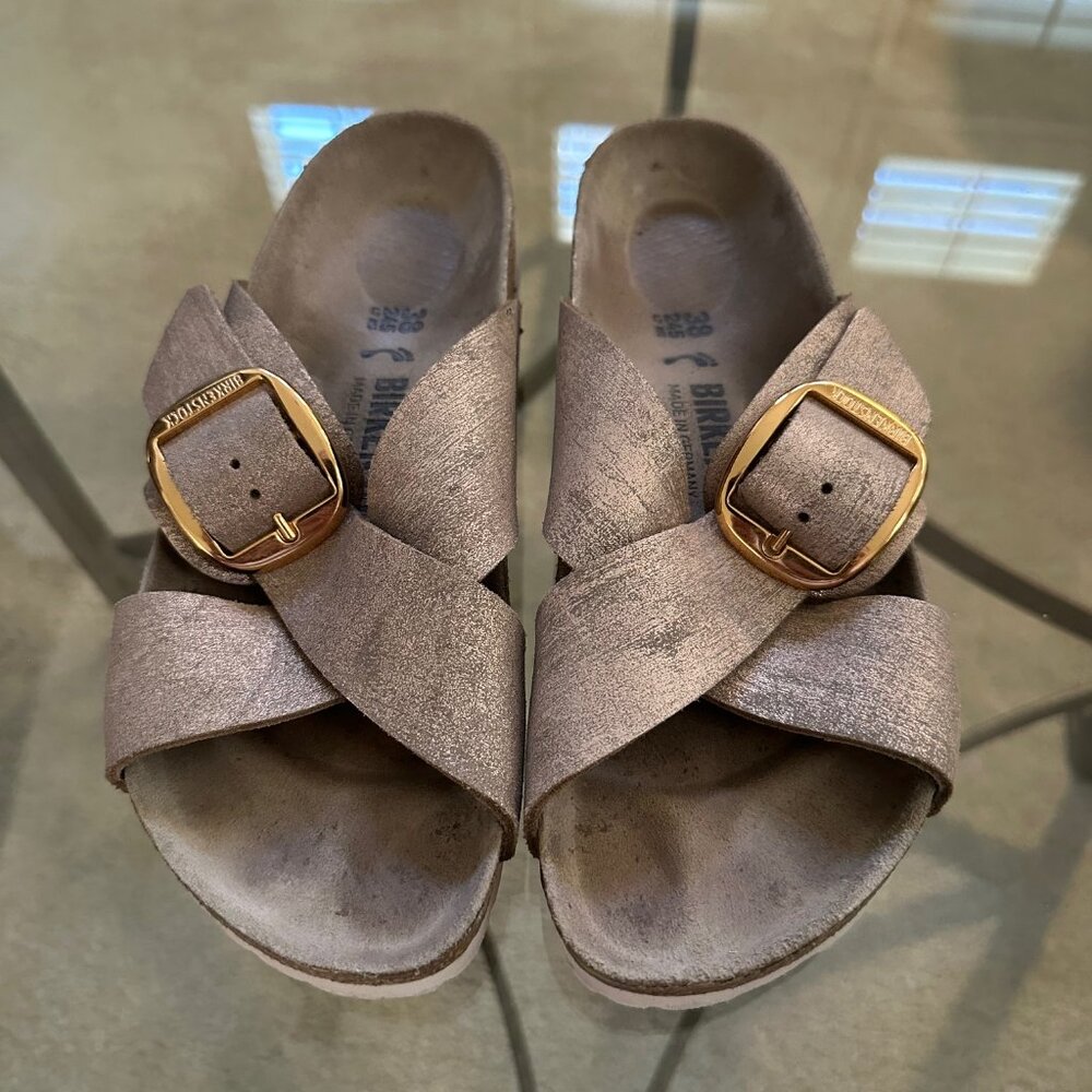 Birkenstock Metallic Taupe Cross-Strap Sandals with Gold Buckles